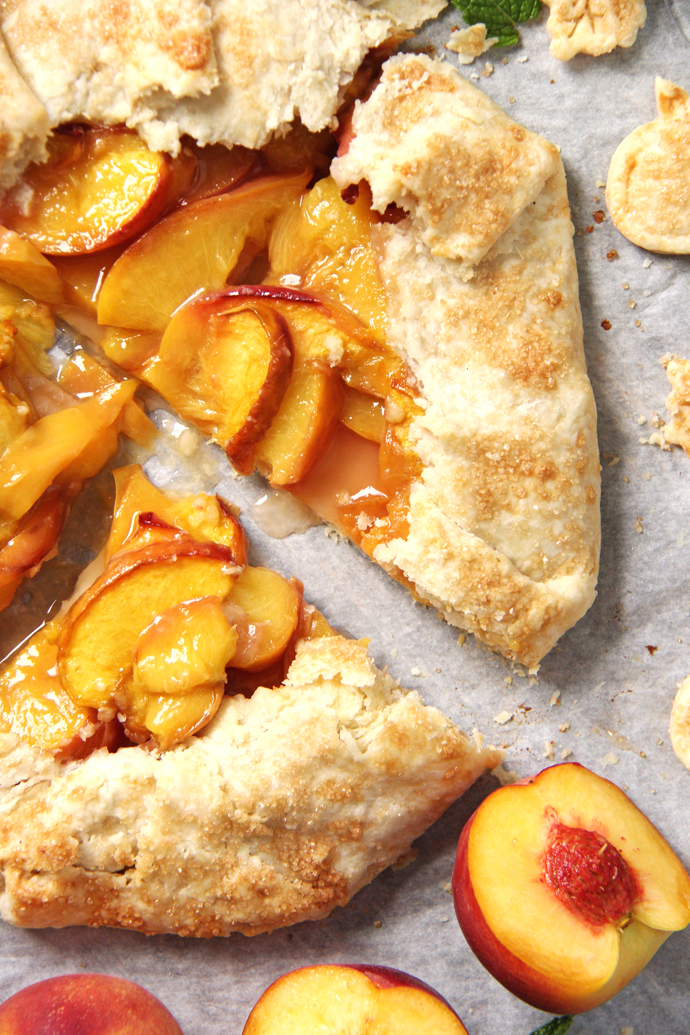 This Rustic Honey Peach Galette so much easier and less fussy to assemble than a traditional top and bottom pie crust. #recipe
