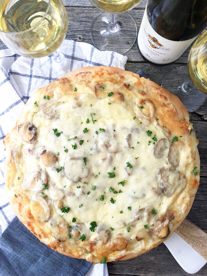 And not just any pizza, this is a recipe for White Pizza with Chicken, Mushrooms and Mozzarella. A recipe that is perfect served up with a glass of Kendall-Jackson Vintner’s Reserve Chardonnay.