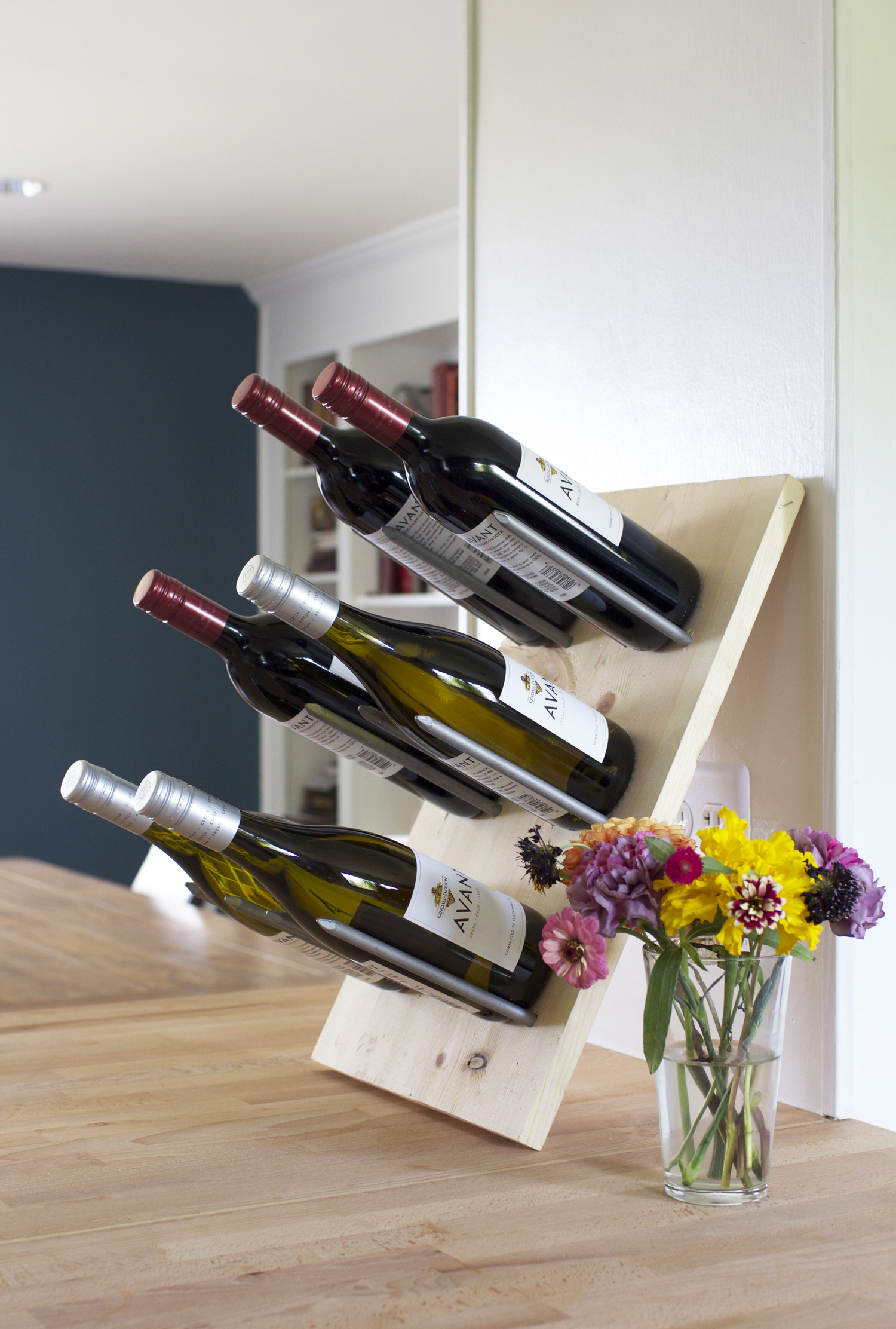 Wine bottles are definitely pretty enough to be displayed, and this way it’ll be easy to keep track of what wine you have on hand! #DIY #KJAVANT