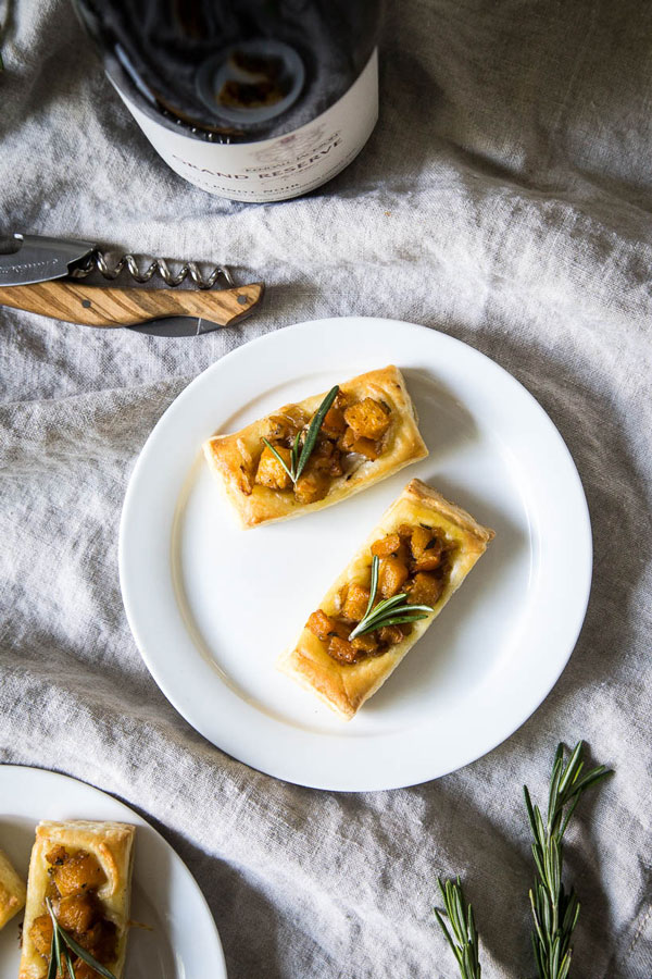 These Pumpkin & Rosemary Puff Pastry Bites are incredibly easy to pull together and make for the perfect bite-sized fall appetizer.