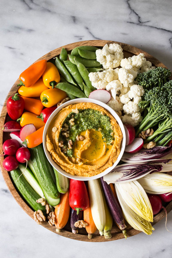 This sweet potato hummus with kale pesto & fall crudités recipe is not only seasonal and delicious, but also simple to pull together.