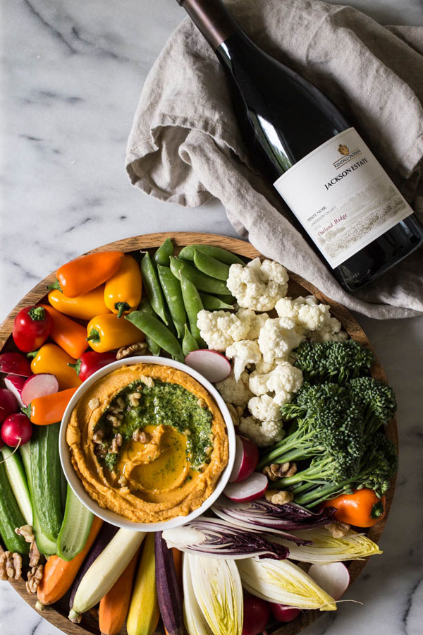 This sweet potato hummus with kale pesto & fall crudités recipe is not only seasonal and delicious, but also simple to pull together.