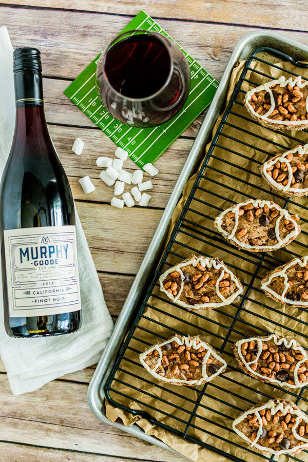 Get excited for gameday with these football shaped chocolate rice krispie treats with a marshmallow fluff drizzle.