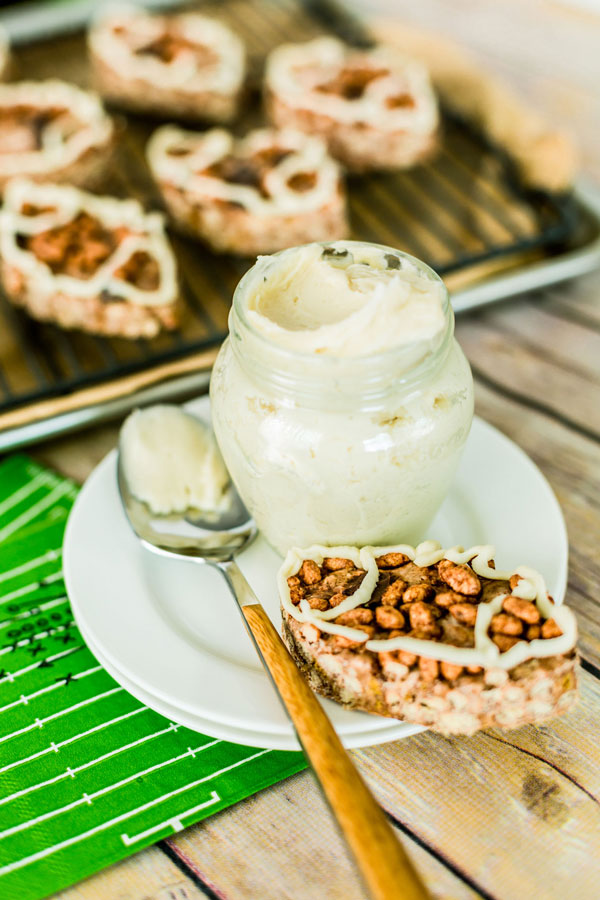 Get excited for gameday with these football shaped chocolate rice krispie treats with a marshmallow fluff drizzle.