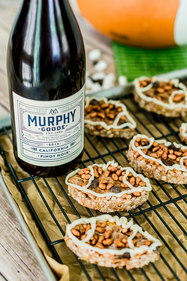 Get excited for gameday with these football shaped chocolate rice krispie treats with a marshmallow fluff drizzle.