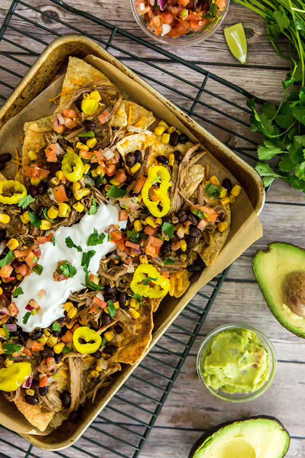 These gameday pulled pork nachos are the winning appetizer to serve up while cheering on your team to a victory!