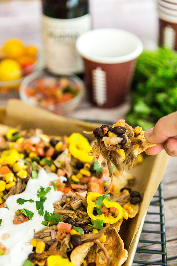 These gameday pulled pork nachos are the winning appetizer to serve up while cheering on your team to a victory!