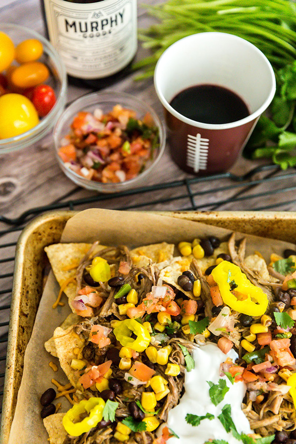 These gameday pulled pork nachos are the winning appetizer to serve up while cheering on your team to a victory!