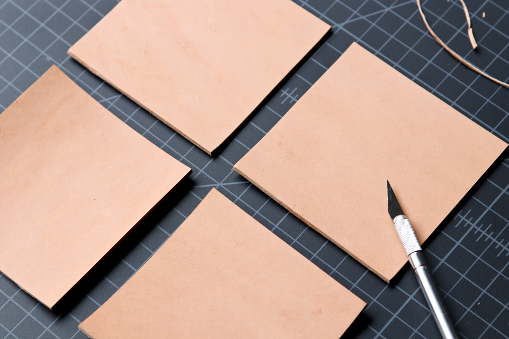 Coming up with the perfect Father's Day gift is really a simple formula: it should be equal parts functional, classic, and stylish, with a dash of long-lasting and a bit of handcrafted. We think these simple leather coasters fit the bill perfectly, but here's the catch: instead of handing your dad or partner a pile of coasters and a bottle of wine, you're going to gift them all the tools and materials to make the coasters themselves. So gather up some tools, materials, and a couple of glasses, and let's celebrate a Father's Day worthy of the Goode Life.